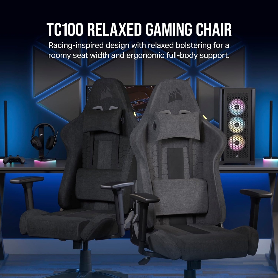 The Corsair TC100 Relaxed in black and in grey fabric, side by side in front of a gaming desk